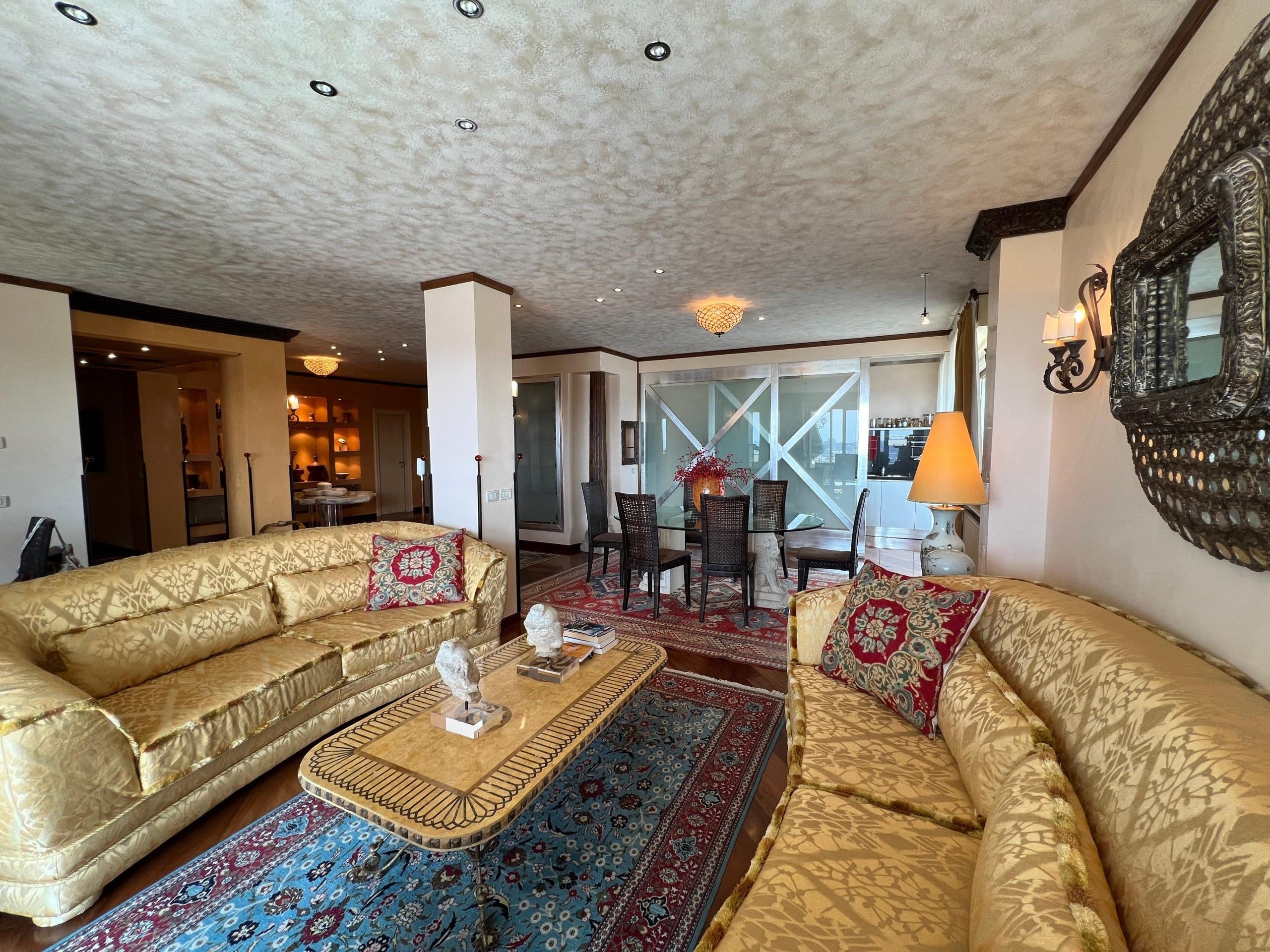 Grand Living Salon with Gold Silk Upholstery & Persian Carpets